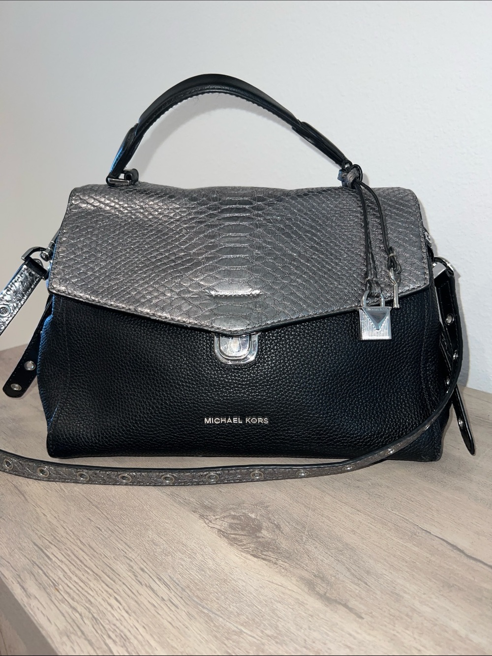Michael Kors Black Pebbled Leather Satchel with Silver Snake Skin Textured Flap